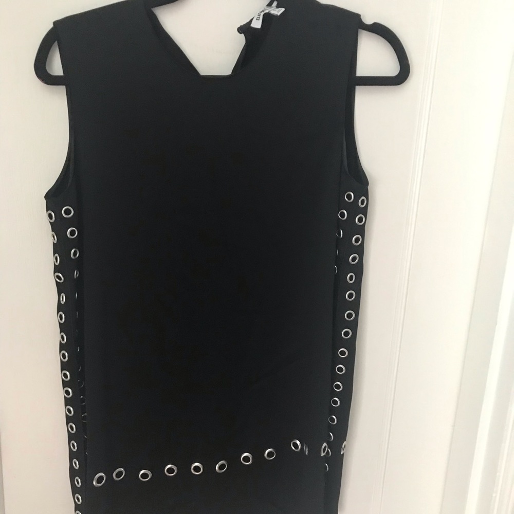 Elizabeth and James long sleeveless tunic. Grommet detailing